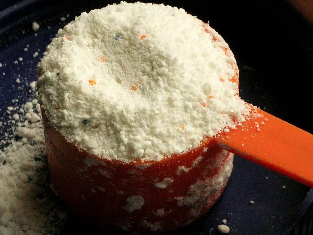 detergent in a measuring cup