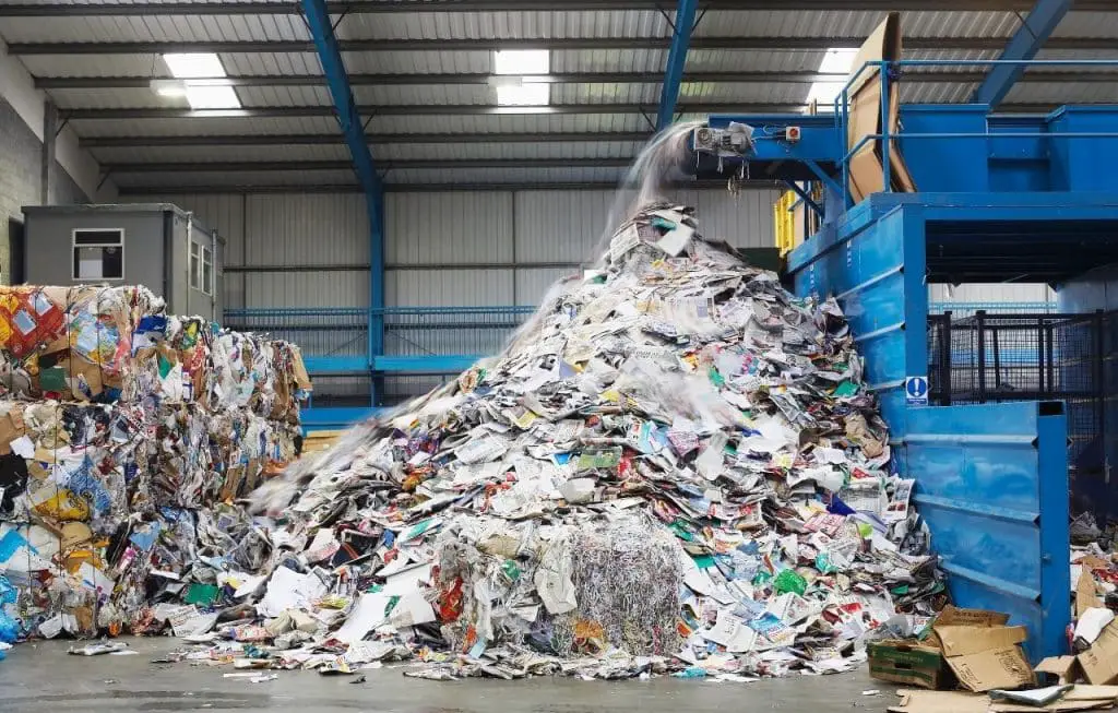 Large pile of garbage in warehouse