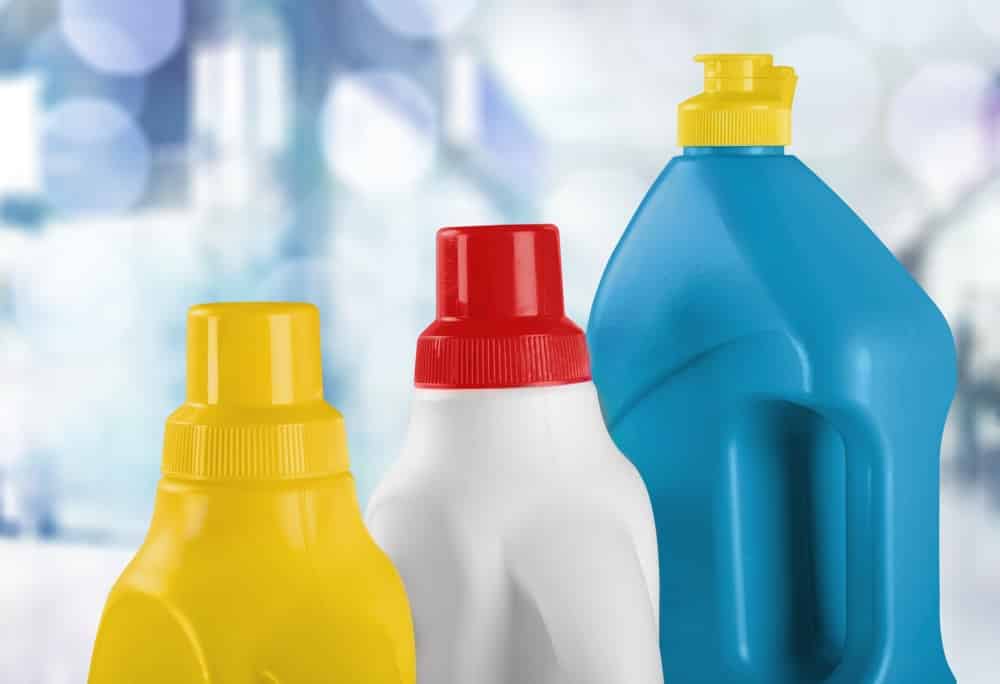 Three cleaning product bottles