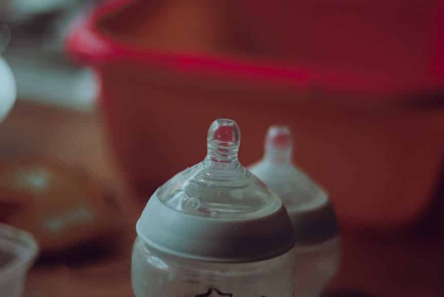 Baby bottle on table