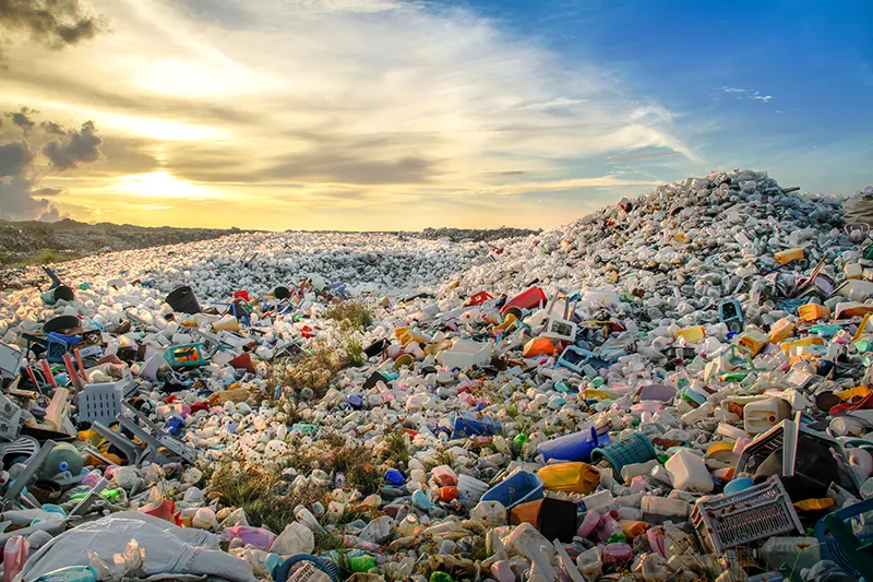 Large pile of colorful plastic bottles and other trash