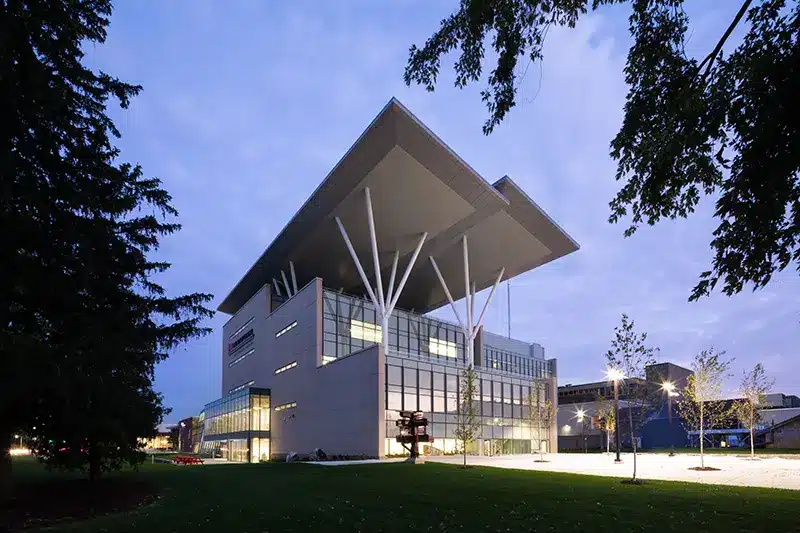 Modern building with a large, curved roof