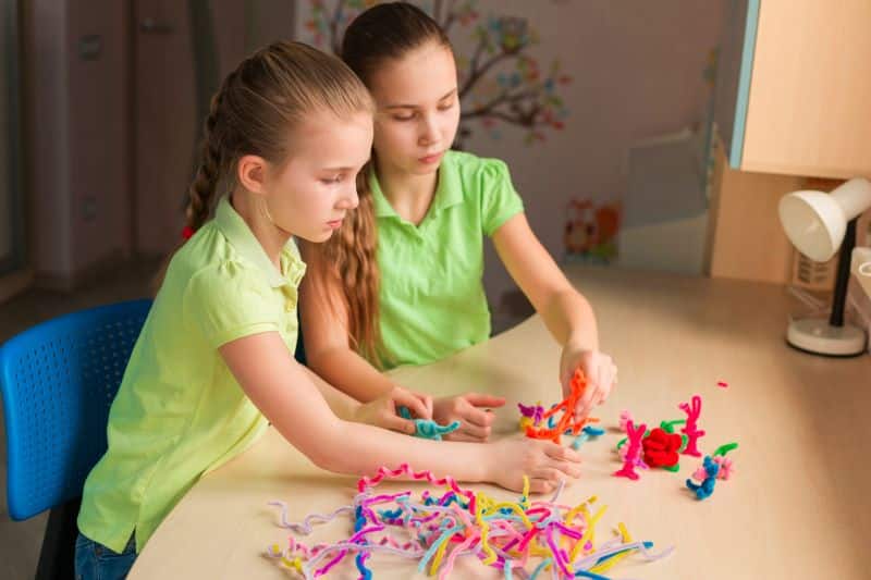 kids playing pipe cleaners