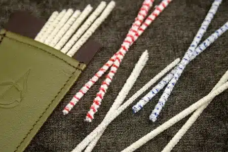 What materials commonly comprise a pipe cleaner?