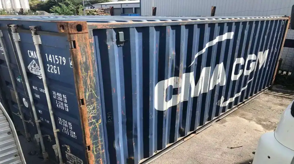 A grade B large shipping container that is over 8 years old and not certified cargo-worthy anymore.