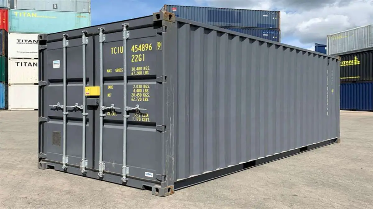 A new, large shipping container in color gray.