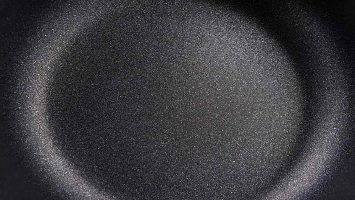 A close up of non-stick pan made from Polytetrafluoroethylene or PTFE. 