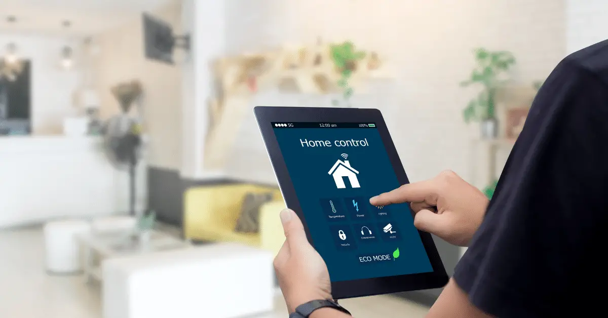a man using smart home technology to control the power settings in his house